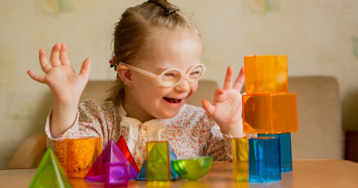 Young girl playing with blocks