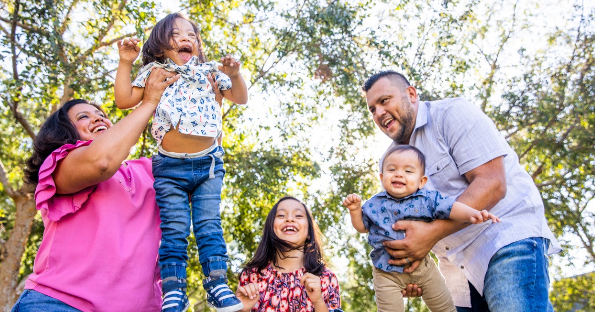 A family plays outside