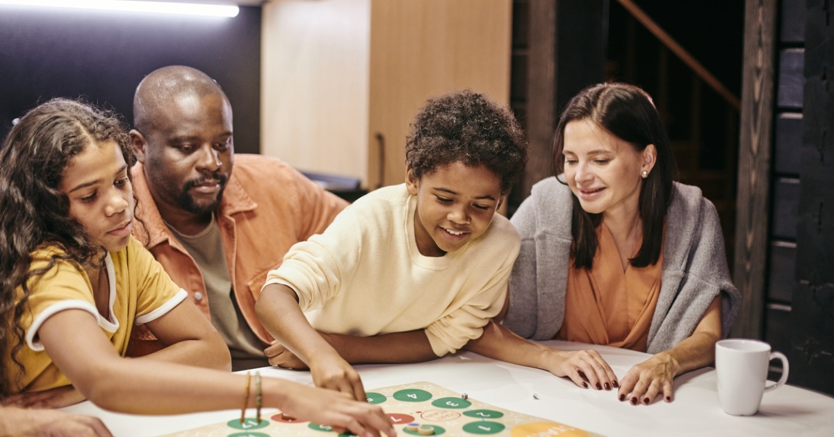 A family plays a board game