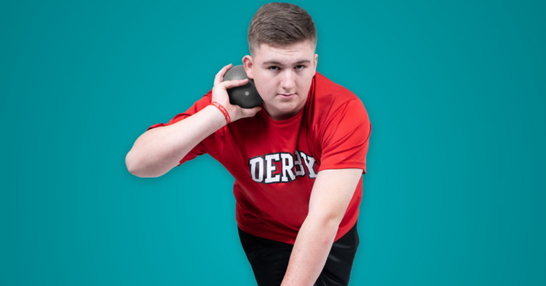 Michael throwing a shotput