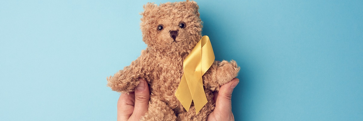 Teddy bear with a yellow ribbon