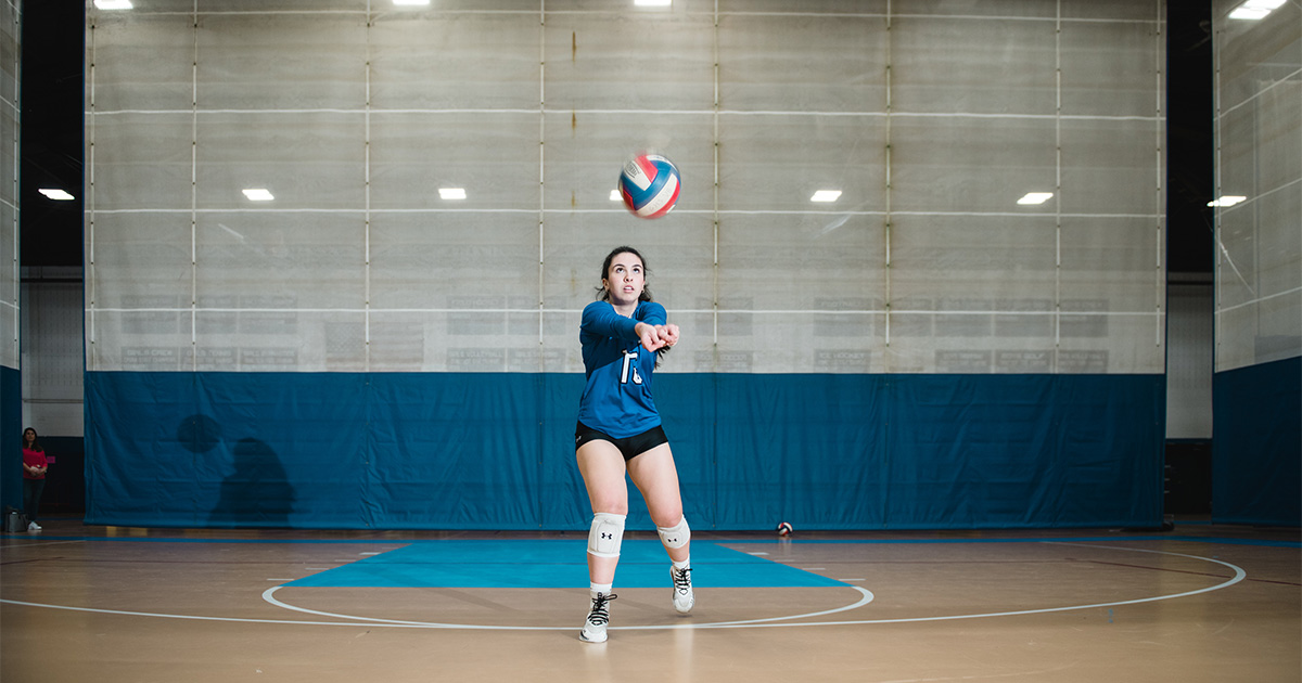 Melina playing volleyball