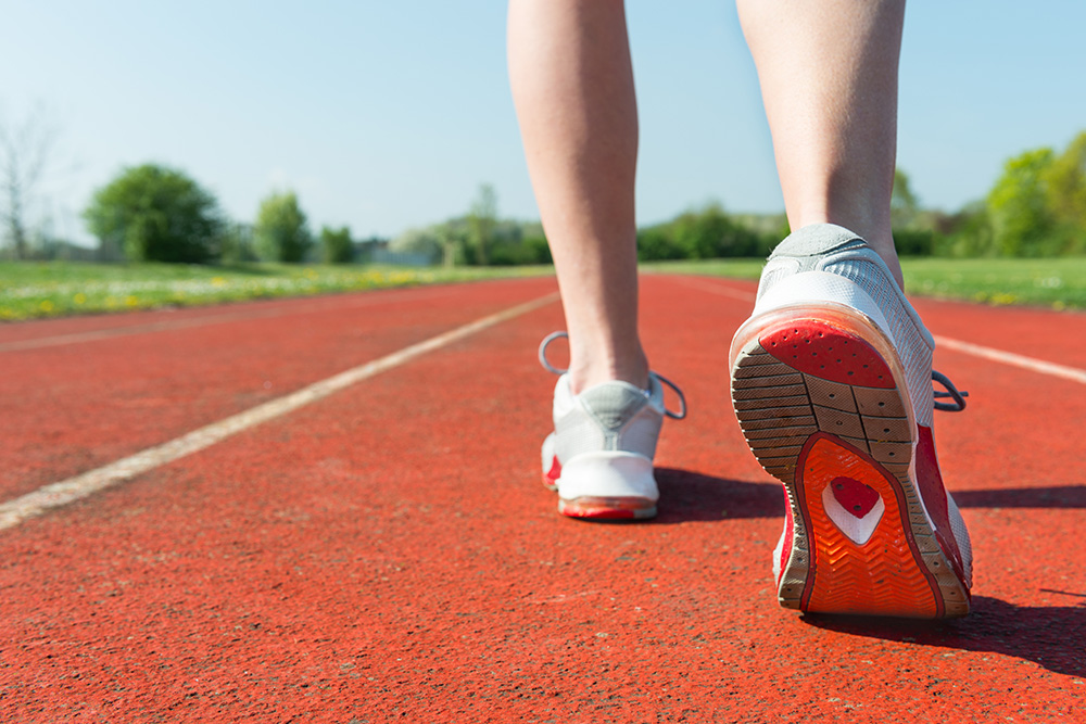 A person standing on a track