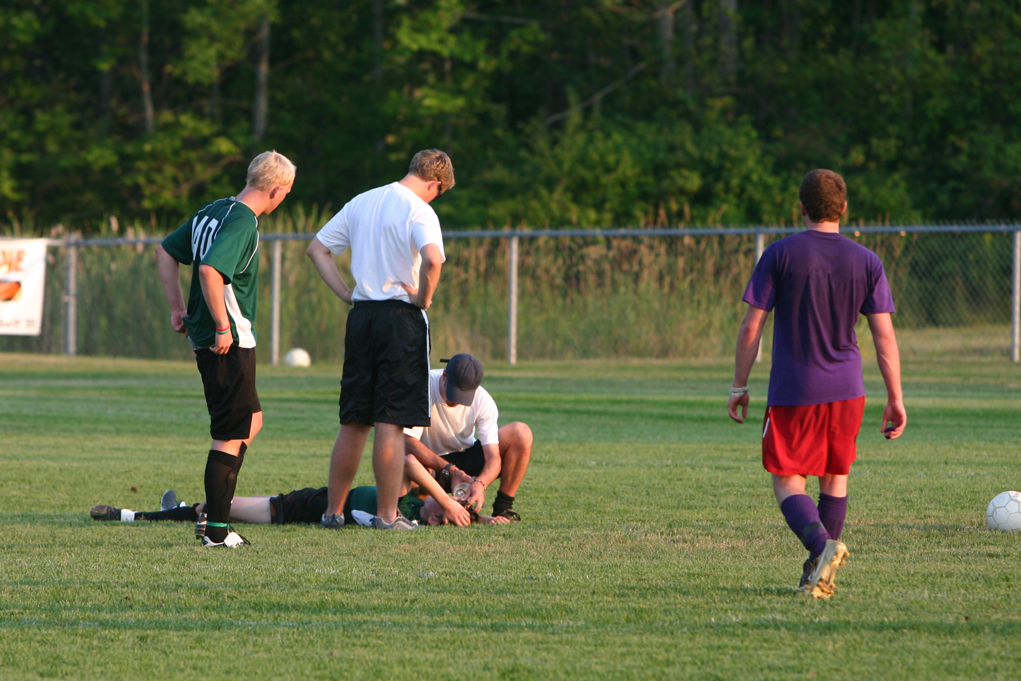 Soccer player down on field with injury