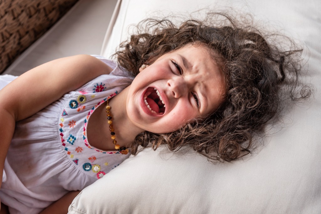 Child screaming in bed