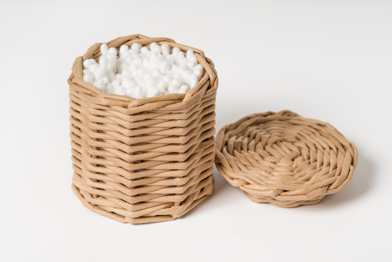 wooden basket full of q-tips which ENTs say NOT to use to clean child's ears