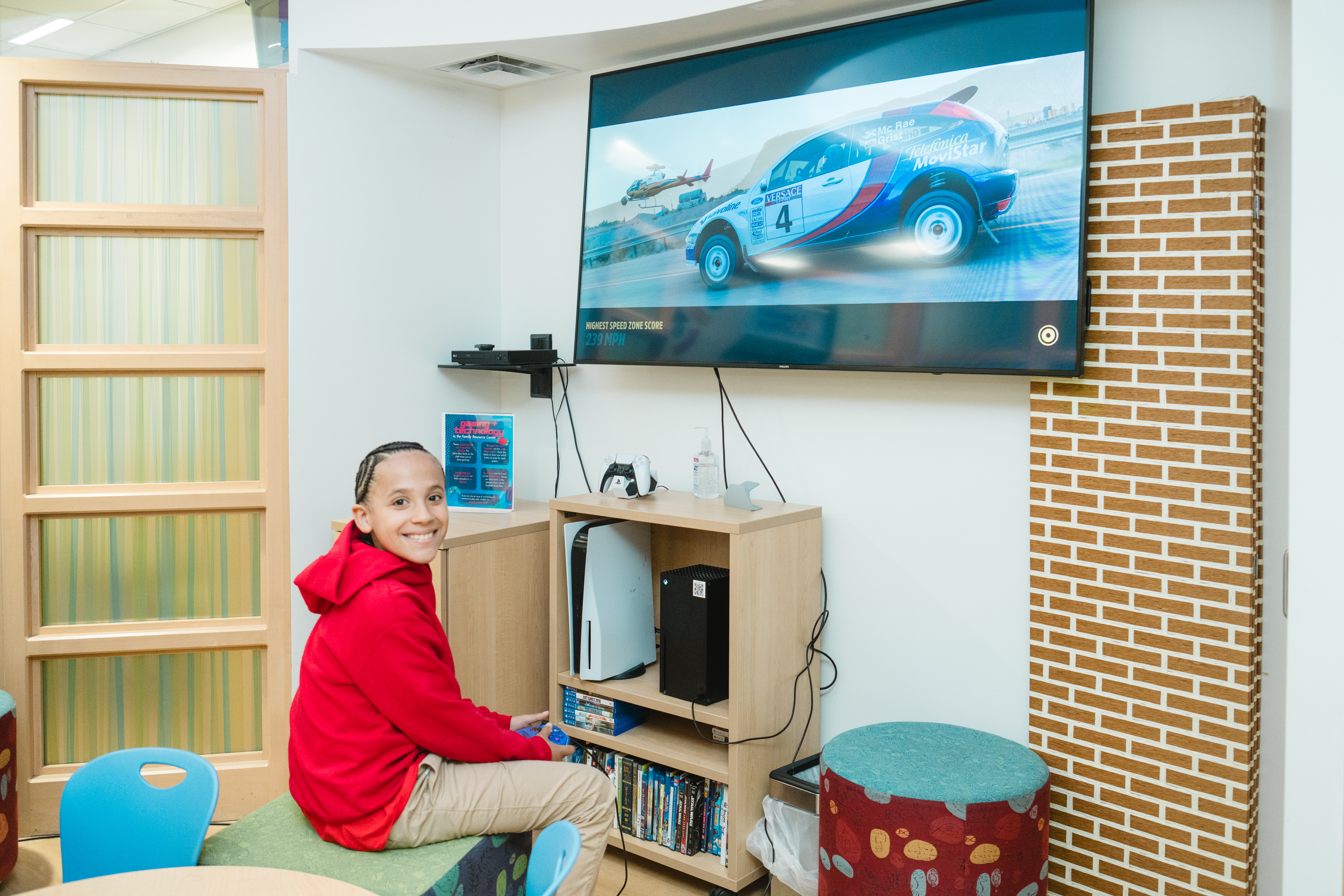 Cash playing video games