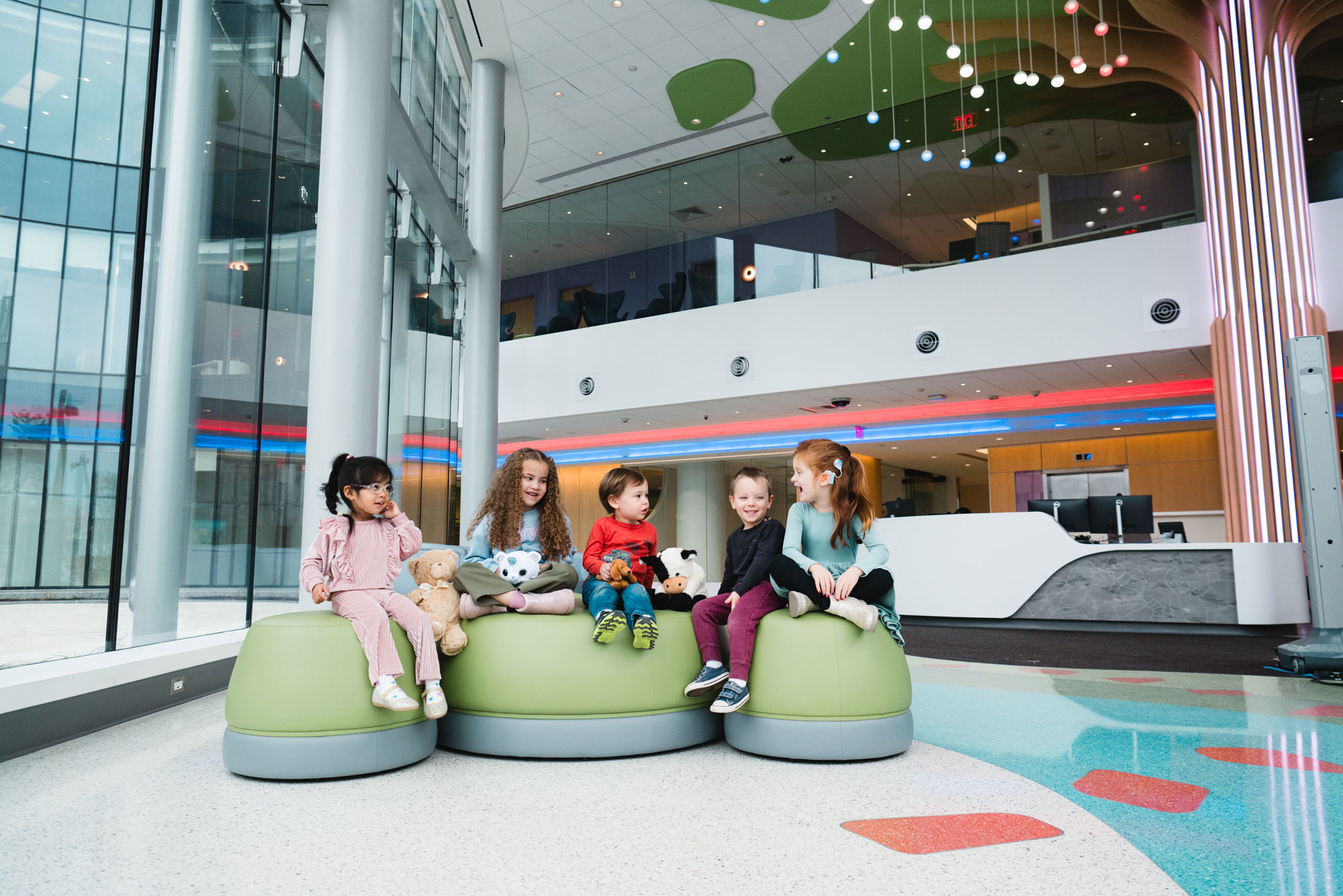 a group of children hanging out in the new clinical tower