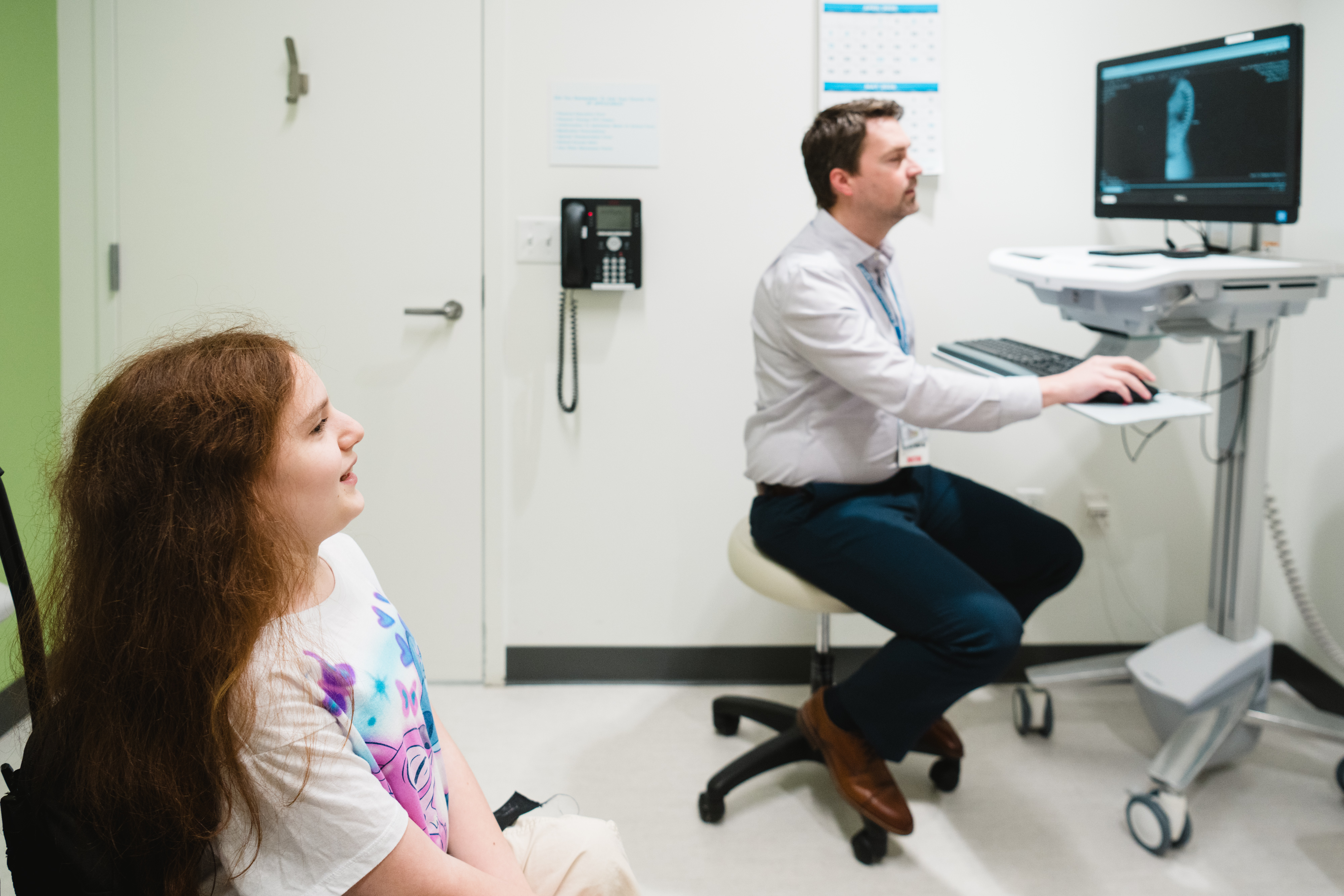 Amelia in Dr. Stelzer's spine clinic post-op