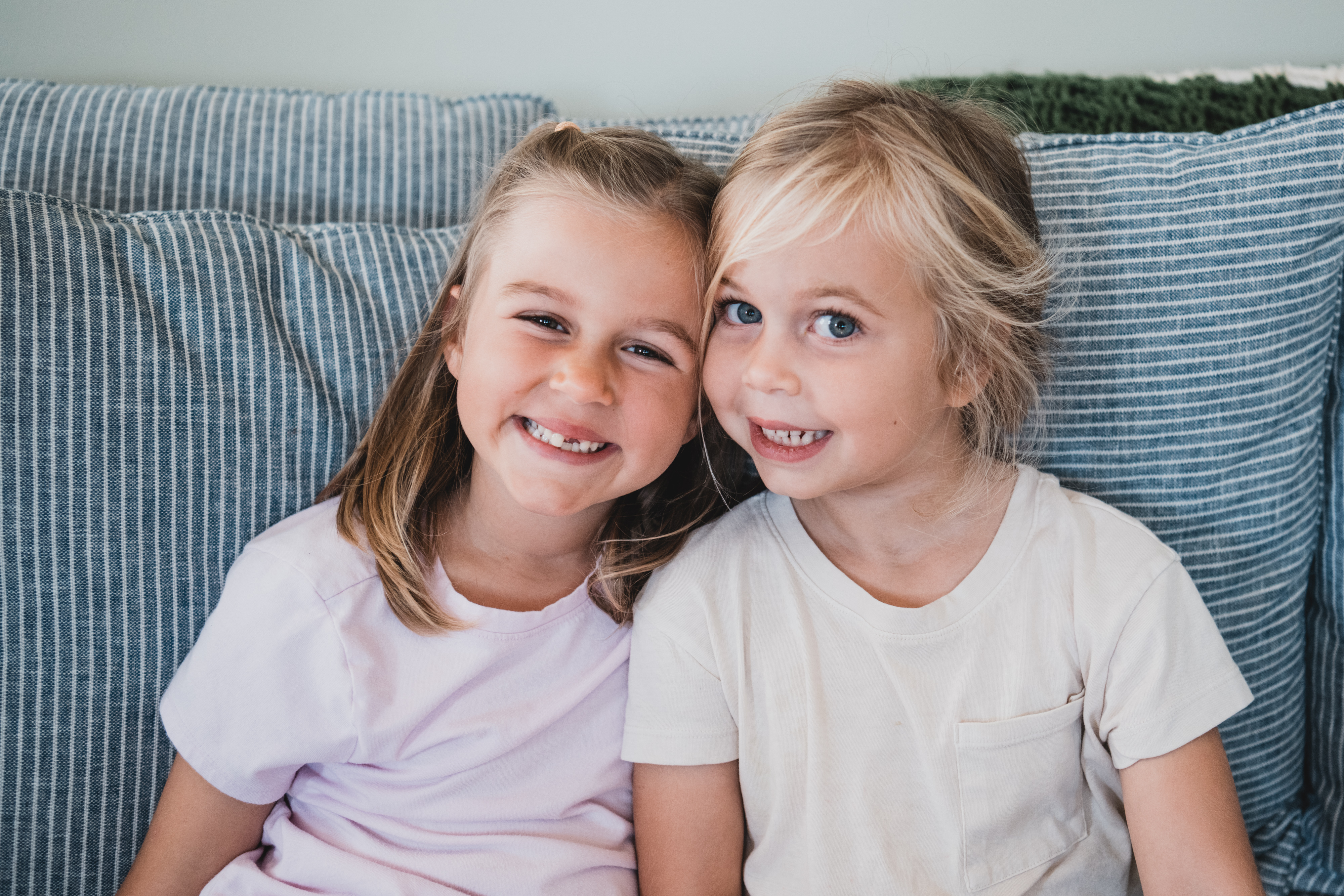 Sisters of a patient diagnosed through the newborn screening program at home.