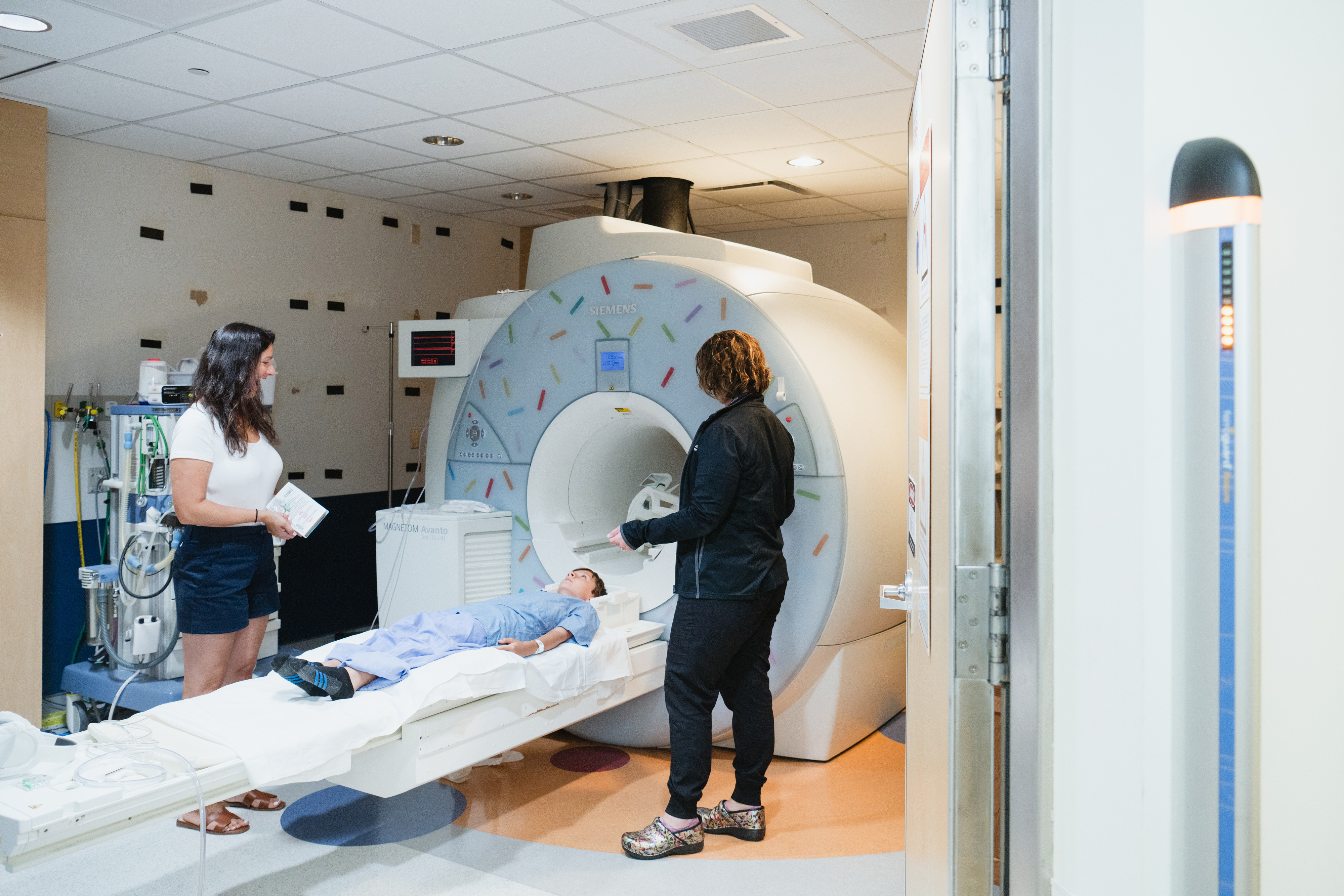 Patient and Provider with MRI Machine