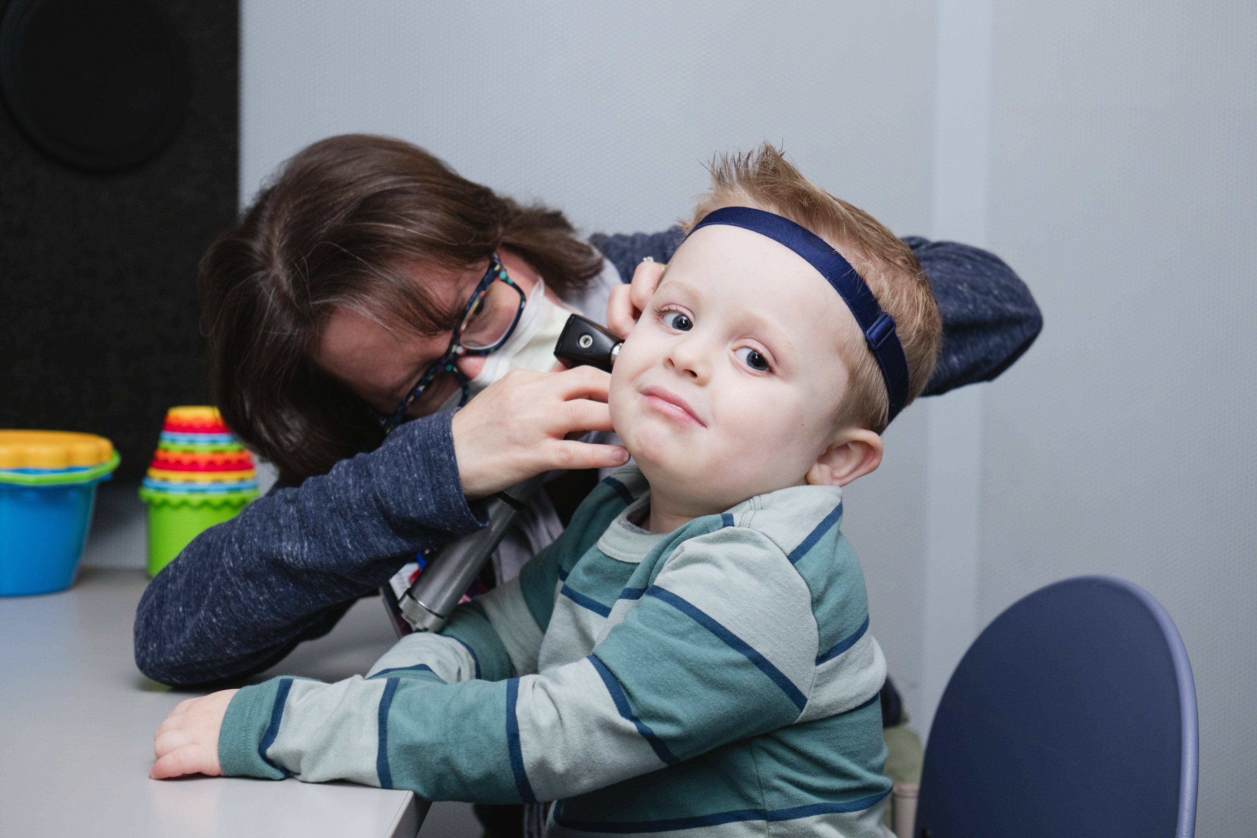 Child receiving a hearing test.