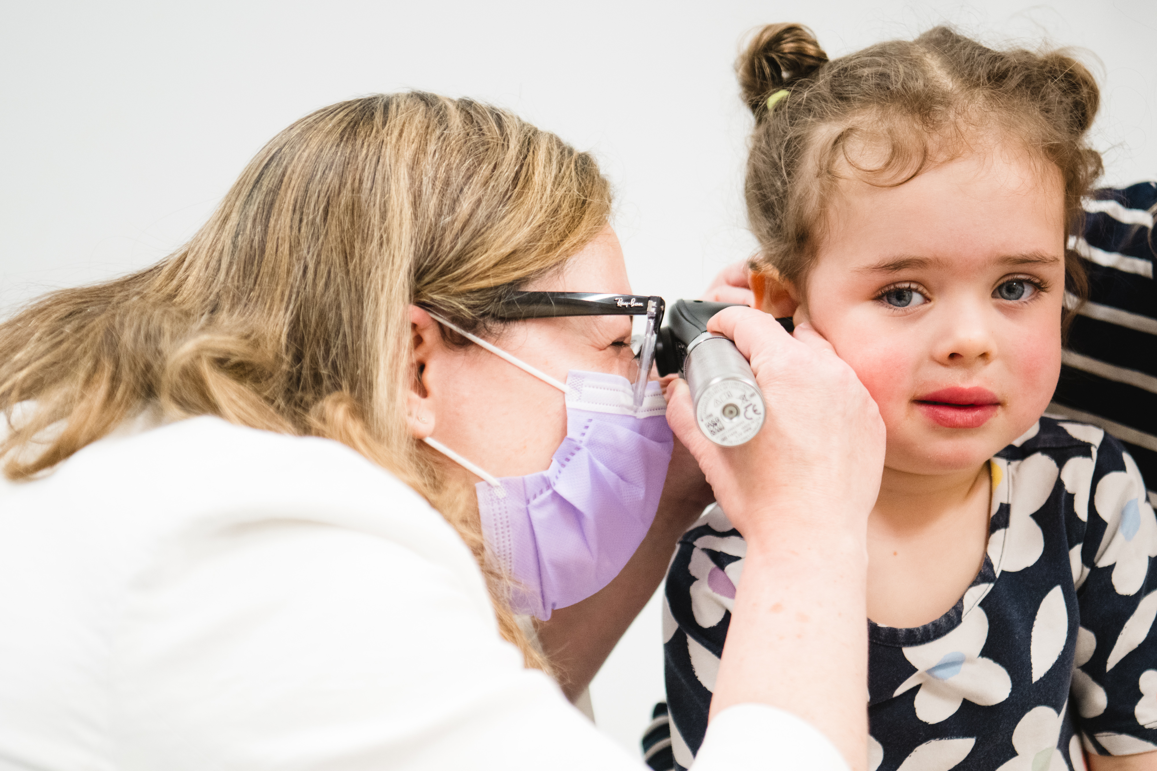 Dr. Wareham examines a patient in the ear, nose, and throat clinic at the Westport Specialty Care Center. Dr. Wareham examines a patient in the ear, nose, and throat clinic at the Westport Specialty Care Center.