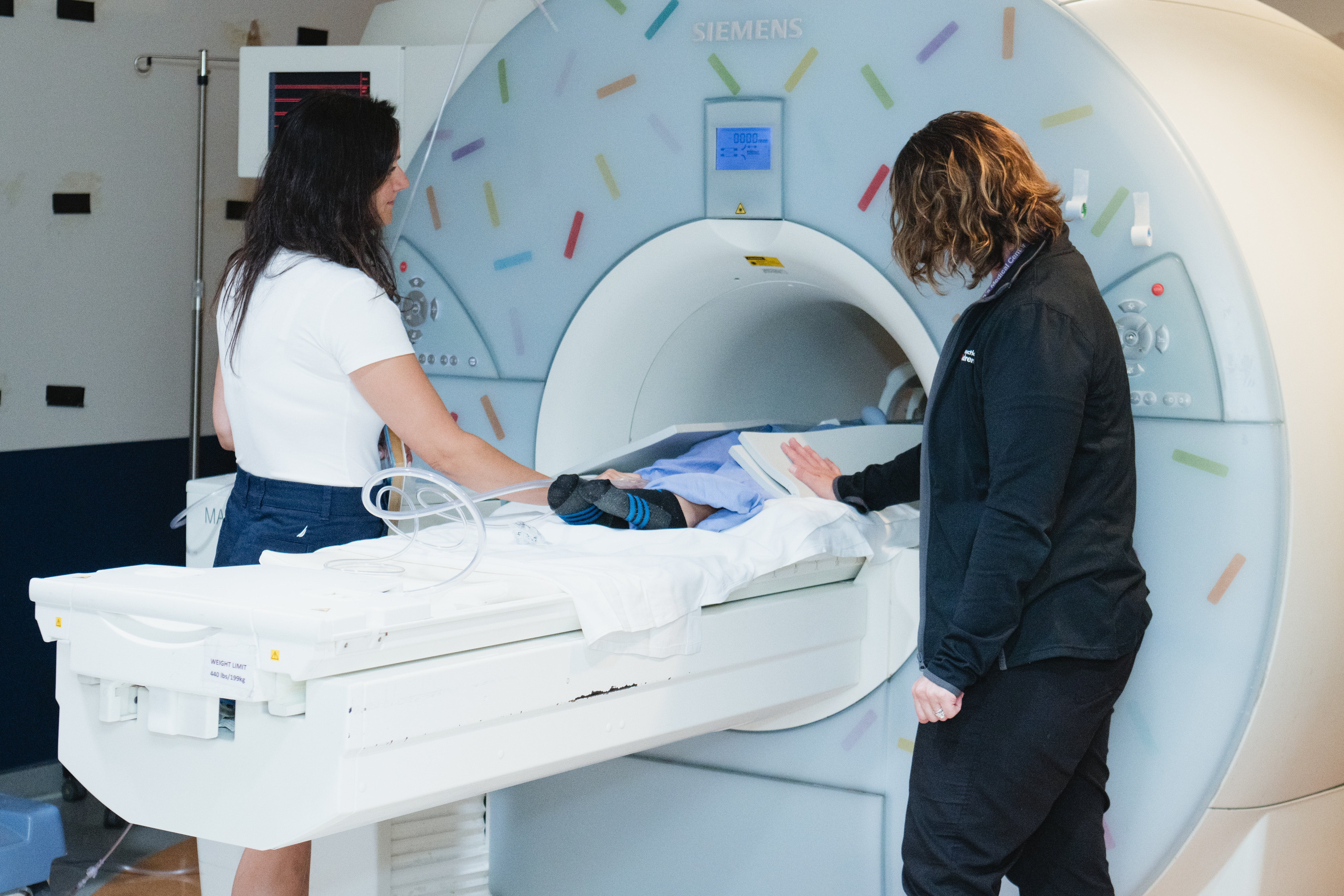 Patient and Provider with MRI Machine