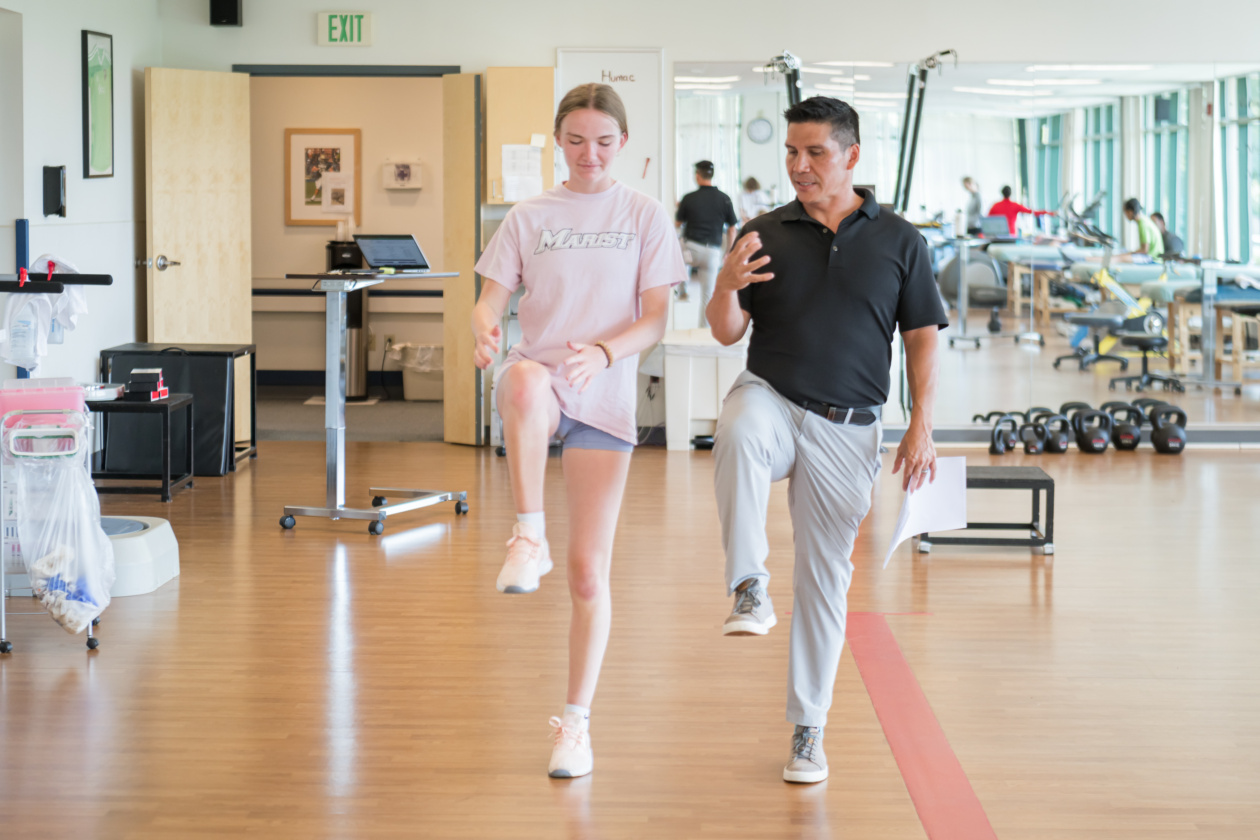 Provider treating Patient in Sports Medicine Department