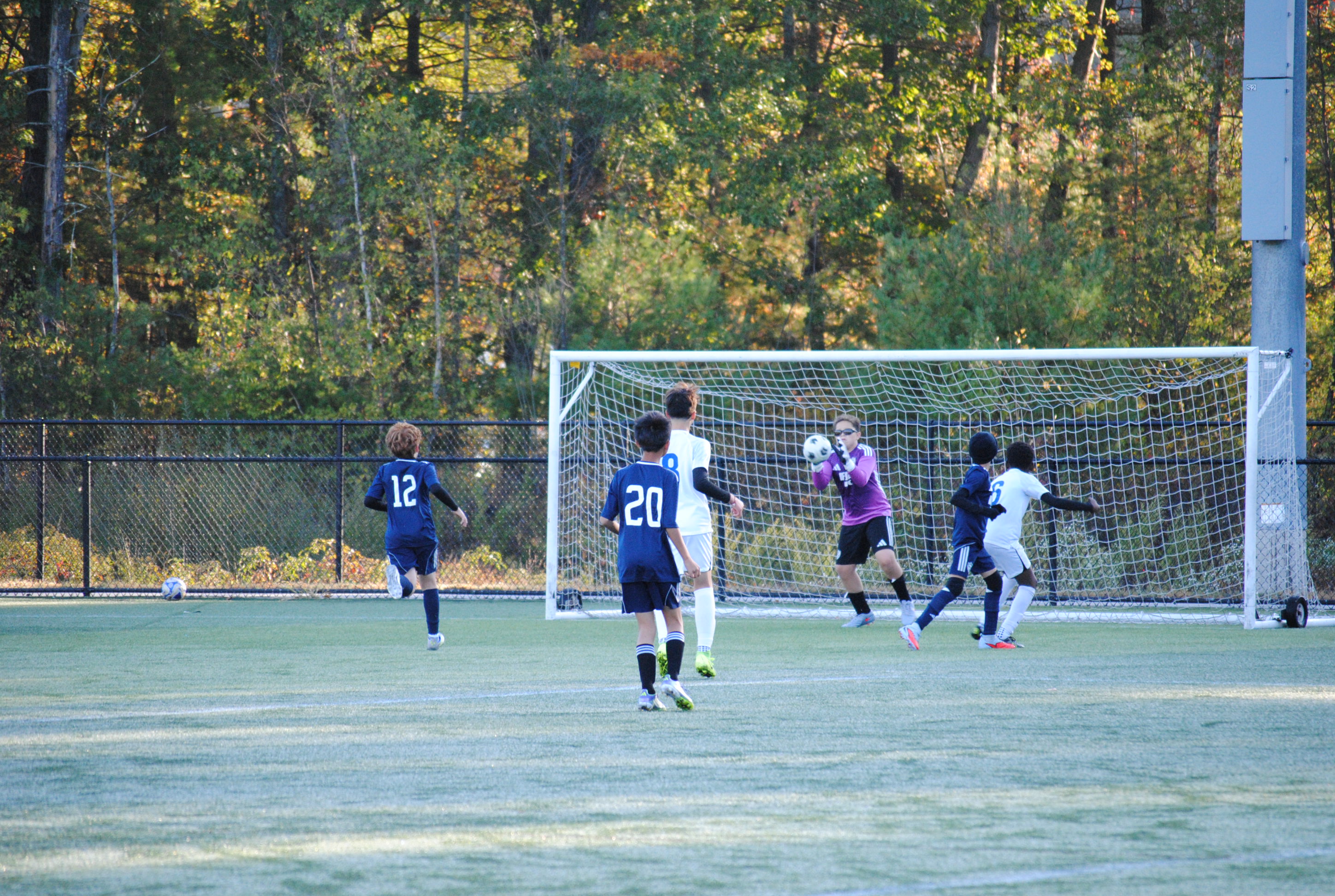 Elijah Stephens playing soccer with FSA
