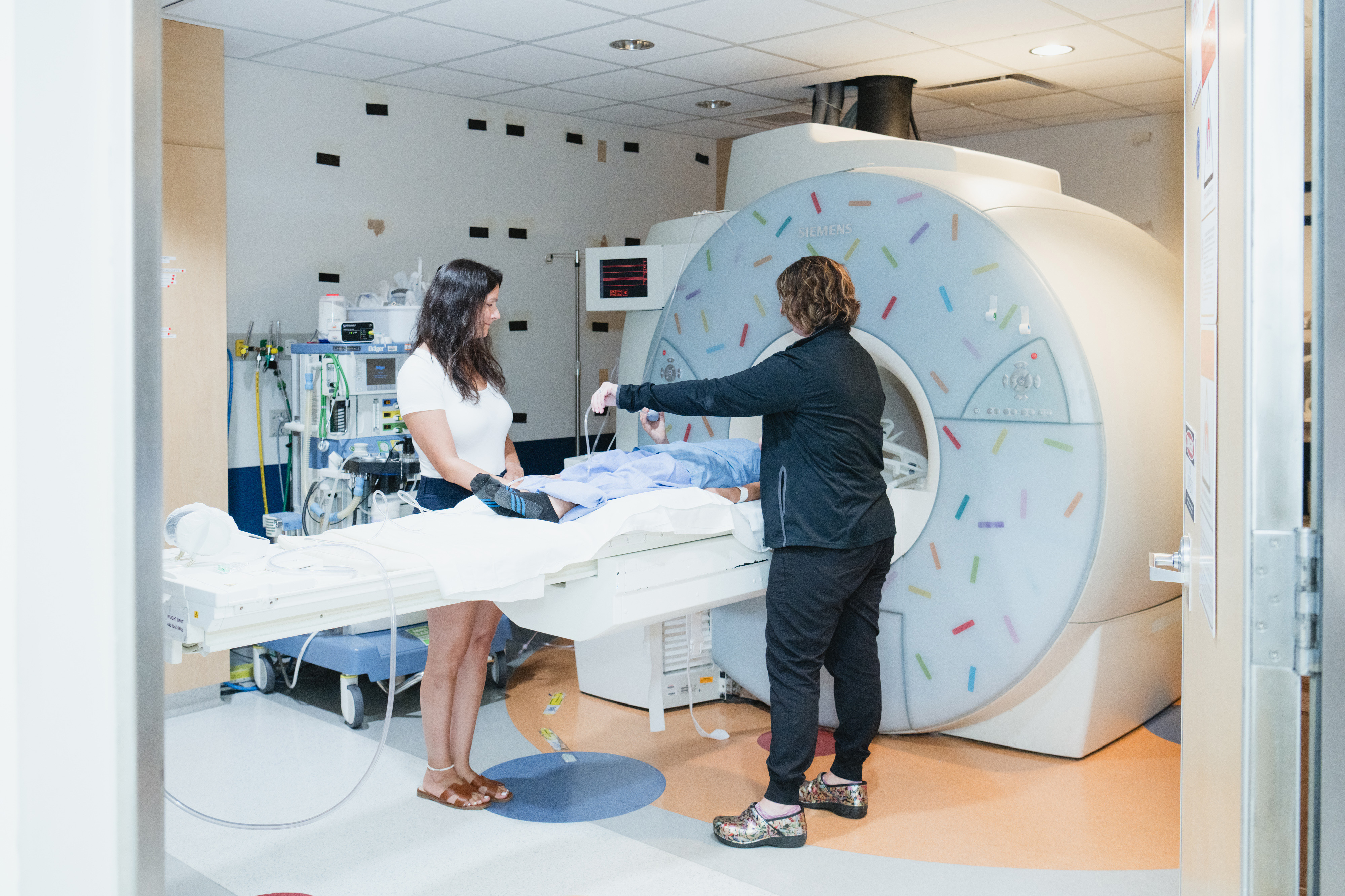 Patient and Provider with MRI Machine