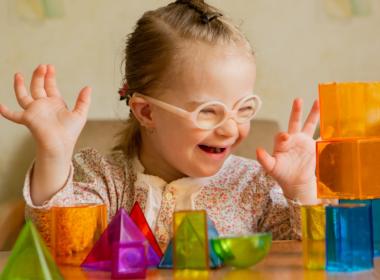 Young girl playing with blocks