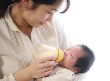 Mother feeding her baby