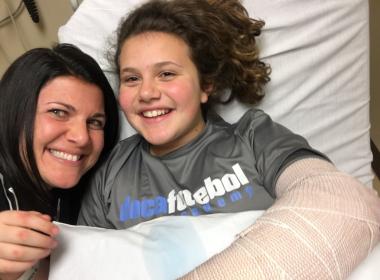 Arianna and Mom, right after wrist surgery at Connecticut Children’s