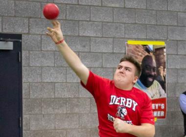 Michael throwing a shotput