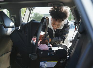 Car Seat Technician Installing a Car Seat