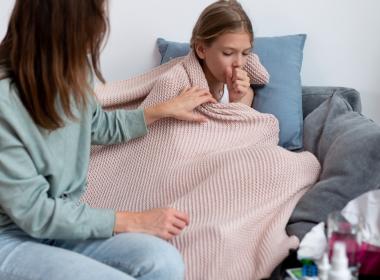 girl is sick and coughing, maybe breathing emergency or respiratory distress