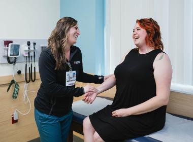 Adult congenital heart disease patient speaks with a team member
