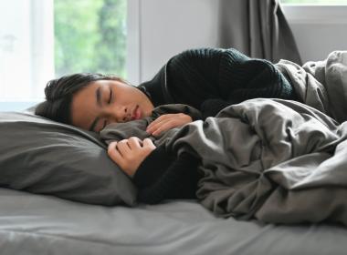 Teenage female sleeping. Athletic training and sleep together are important.