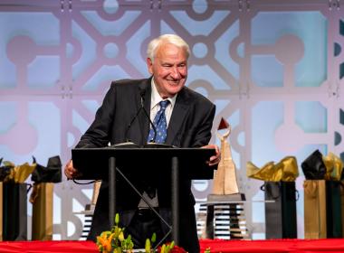 Tom Golisano, philanthrope, at podium 