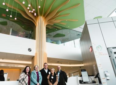 Big Y Philanthropy Committee in Connecticut Children's Lobby, in front of Tree of Life