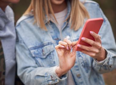 a woman looking at her phone