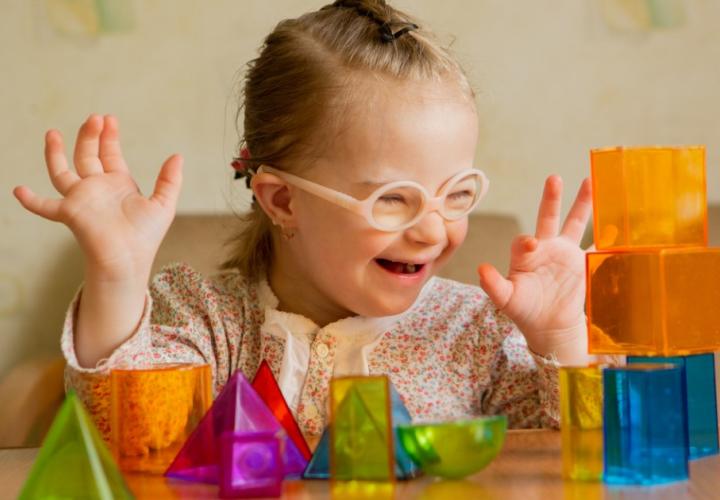 Young girl playing with blocks