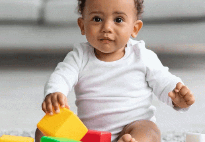 Baby playing with blocks