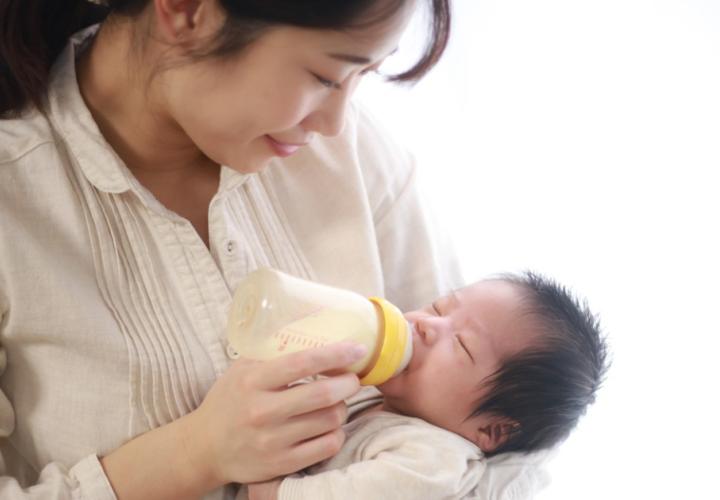 Mother feeding her baby