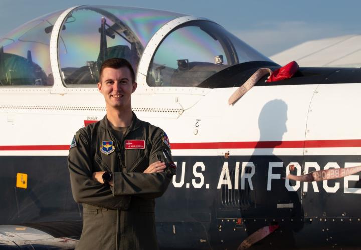 First Lieutenant John Kostal stands (and flies!) proud as a United States Air Force officer.
