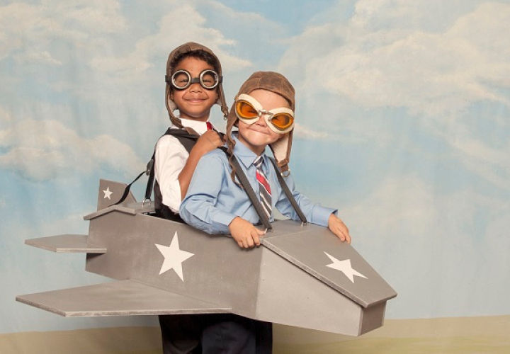 2 boys dressed as pilots in a play