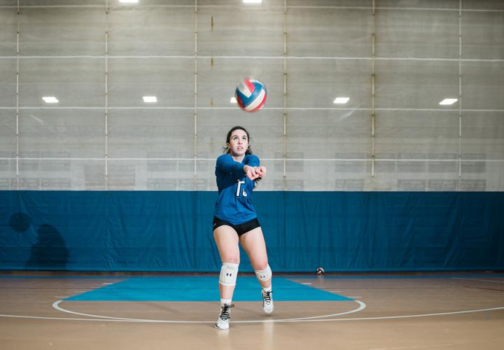 Melina playing volleyball