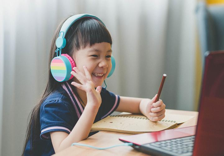 Young girl during remote learning