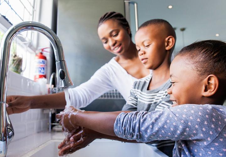 children washing their hands