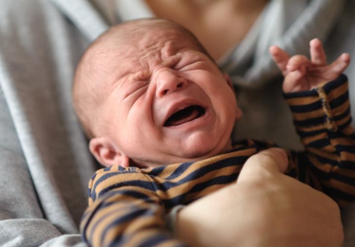 Newborn baby screaming head off with colic. 