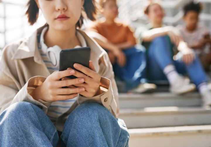 Teen on her phone