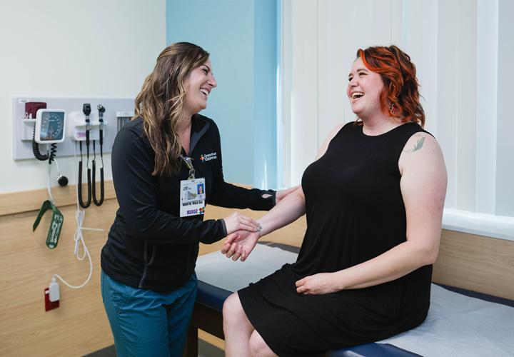 Adult congenital heart disease patient speaks with a team member