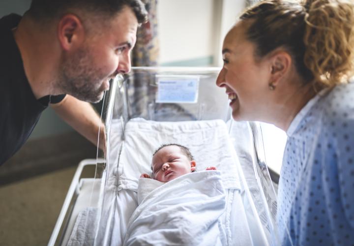 Family with newborn baby