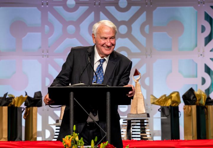 Tom Golisano, philanthrope, at podium 
