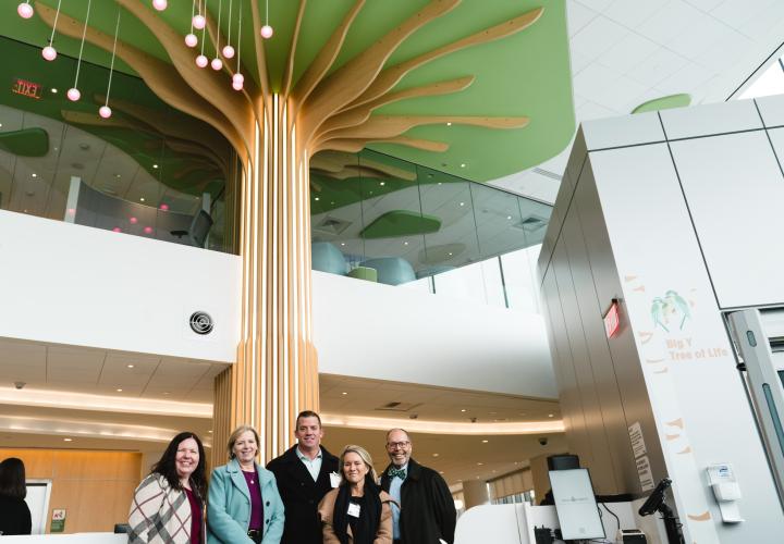 Big Y Philanthropy Committee in Connecticut Children's Lobby, in front of Tree of Life