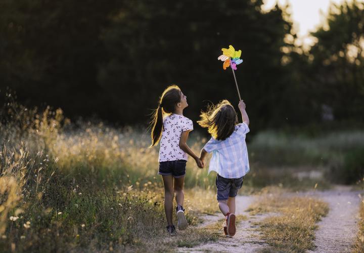 Two girls playing outside