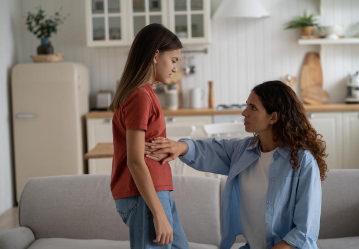 School-aged girl with stomach pain, mom concerned