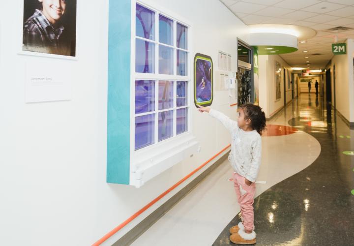 Child patient interacting with Disney Tech Child patient interacting with Disney Tech