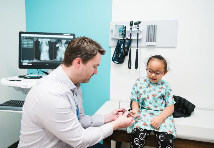 Scoliosis patient in spine clinic with Dr. Stelzer.